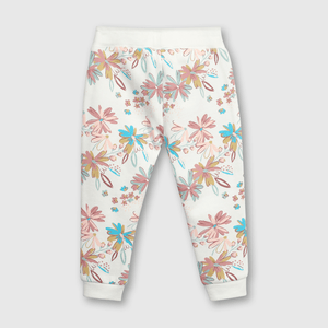 Pantalón buzo de buzo floreado Crema